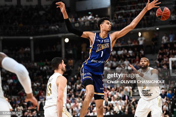 Metropolitan 92's French power forward Victor Wembanyama fights for the ball during the French Elite basketball semi-final playoff match 2 between...