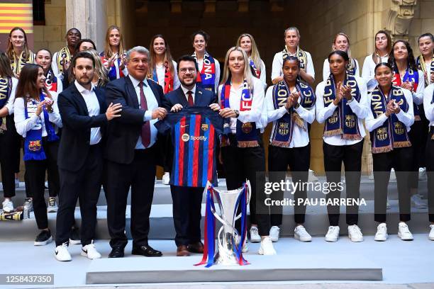 Barcelona's Spanish head coach Jonatan Giralde, Barcelona's President Joan Laporta, Catalan regional president Pere Aragones, and Barcelona's Spanish...