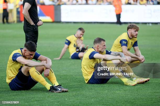 Union's players react at the end of the Belgian "Pro League" First Division football match between Club Brugge KV and Royale Union Saint-Gilloise at...