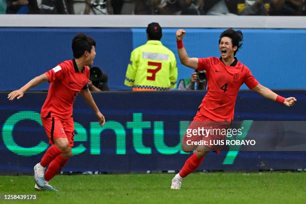 South Korea's defender Choi Seok-hyun celebrates with teammate Lee Seung-won after scoring his team's first goal during the Argentina 2023 U-20 World...