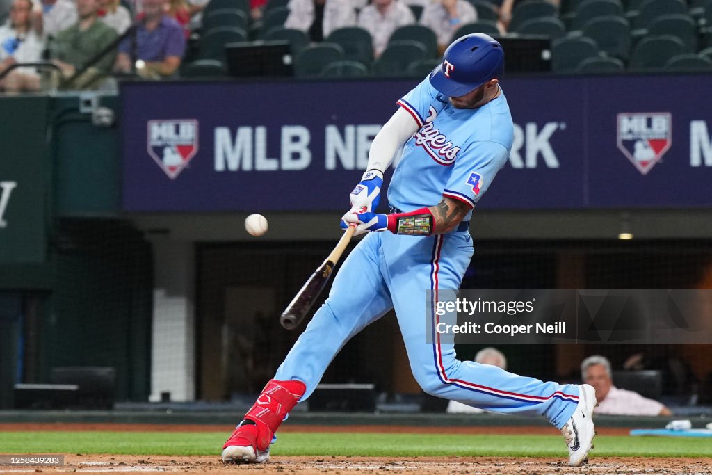 Texas Ranger Heim Jonah Heim of the Texas Rangers hits a two-run single in the first ...