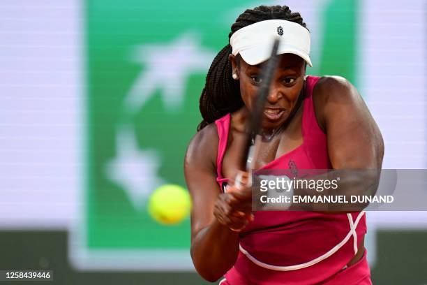 Sloane Stephens plays a backhand return to Belarus' Aryna Sabalenka during their women's singles match on day eight of the Roland-Garros Open tennis...