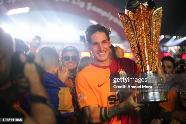 Nicolo Zaniolo of Galatasaray lifts the Super Lig during the Super Lig match between Galatasaray and Fenerbahce at NEF Stadyumu on June 4, 2023 in...
