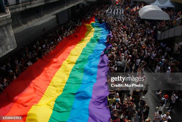 People ta. Various groups of LGBTQ gathered at central of Bangkok for the pride parade rally on June 4 dressed in colorful costumes and demanding for...