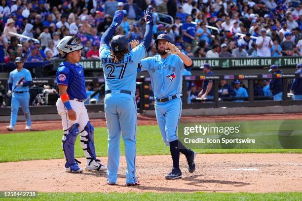 Toronto Blue Jays Designated Hitter Vladimir Guerero Jr. Congratulates Toronto Blue Jays Designated Hitter Brandon Belt for hitting a two run home...