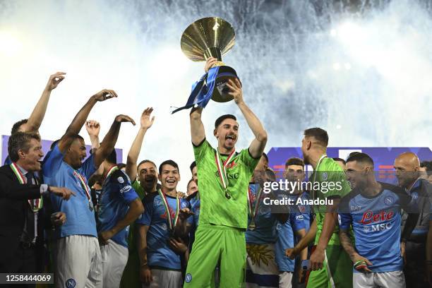 Players of Napoli, hold up the trophy of the Scudetto as winner of the championship at the end of the Italian Serie A football match between Napoli...