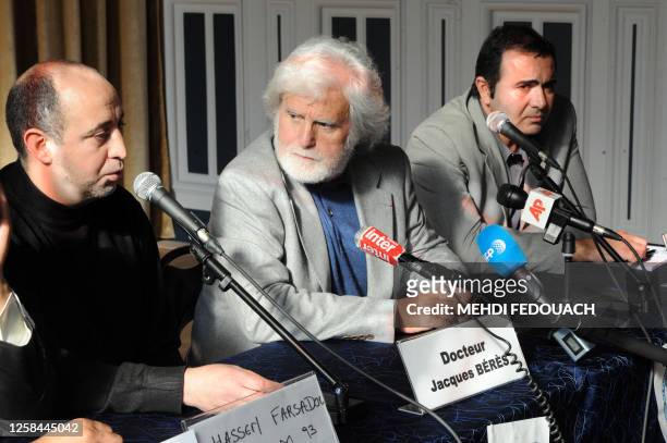 Jacques Beres , French Doctor and co-founder of Medecins Sans Frontieres , flanked by Hassen Farsadou , head of the Union of Muslim Associations of...