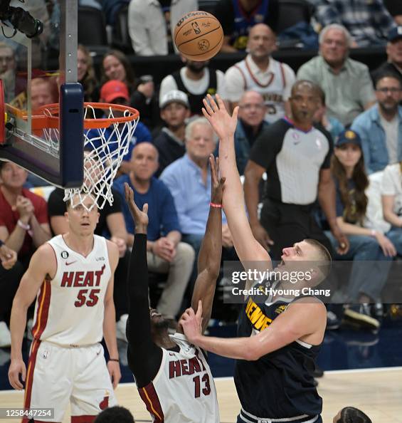 Nikola Jokic Of The Denver Nuggets Scores Against Bam Adebayo Of The nikola-jokic-of-the-denver-nuggets-scores-against-bam-adebayo-of-the