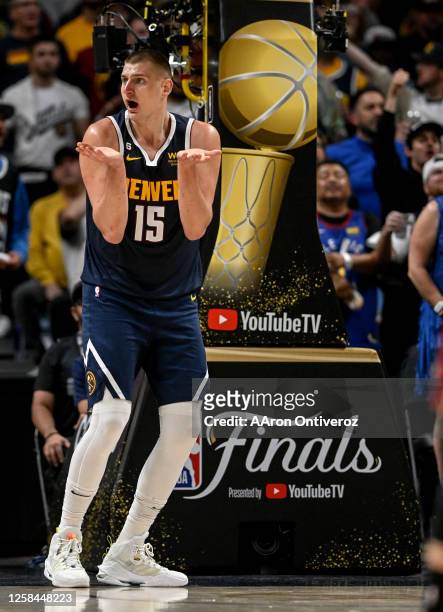 Nikola Jokic of the Denver Nuggets reacts as the Miami Heat battle in the third quarter during Game 2 of the NBA Finals at Ball Arena in Denver on...