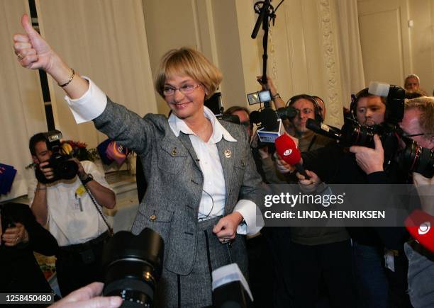 Pia Kjaersgaard, leader of far-right Danish People's Party , gives a thumb up upon arrival at Christiansborg Palacelate 08 February, 2005. Danish...