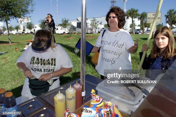 Camille Oliver a resident of Pennsylvania who came down to Florida to witness and participate in the Florida vote recount issue, wears a t-shirt that...