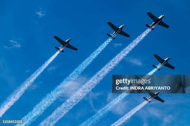 Indonesia's Navy air planes Bonanza perform during the opening of the 4th Multilateral Naval Exercise Komodo 2023 in Makassar, South Sulawesi on June...