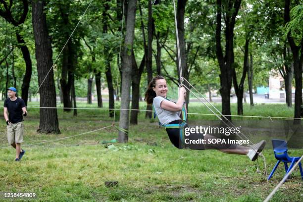 Children are seen bungee riding in Gamow Square during the Children's Day. Odessa People's Church organised an event on World Children's Day in Gamow...