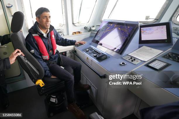 Prime Minister Rishi Sunak onboard Border Agency cutter HMC Seeker during a visit to Dover, ahead of a press conference at Western Jet Foil in Dover,...