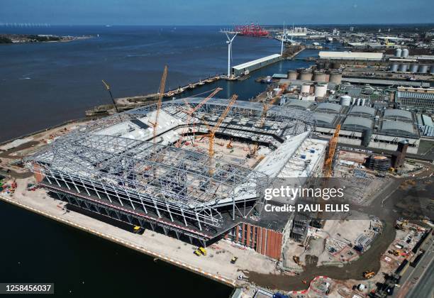 Photograph taken on June 5, 2023 shows an aerial view of Everton's new football stadium under construction on the the Bramley Moore Dock, in...