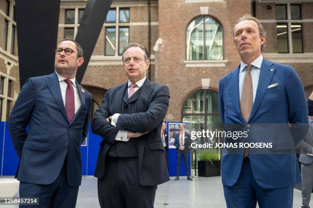 Justice Minister Vincent Van Quickenborne and Antwerpen Mayor Bart De Wever Port of Antwerp CEO Jacques Vandermeiren are pictured at a meeting of the...