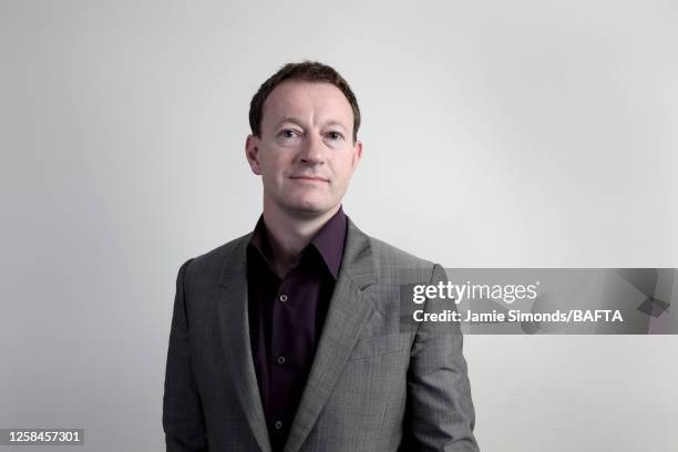 Screenwriter Simon Beaufoy is photographed for BAFTA on September 17, 2010 in London, England.