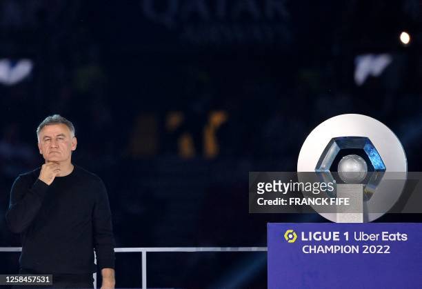 Paris Saint-Germain's French head coach Christophe Galtier reacts during the 2022-2023 Ligue 1 championship trophy ceremony following the L1 football...