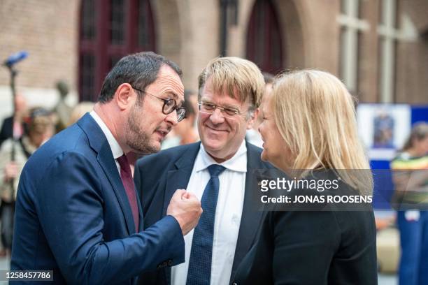 Justice Minister Vincent Van Quickenborne, German ambassador to Belgium Martin Kotthaus and German interior minister Nancy Faeser pictured ahead of a...