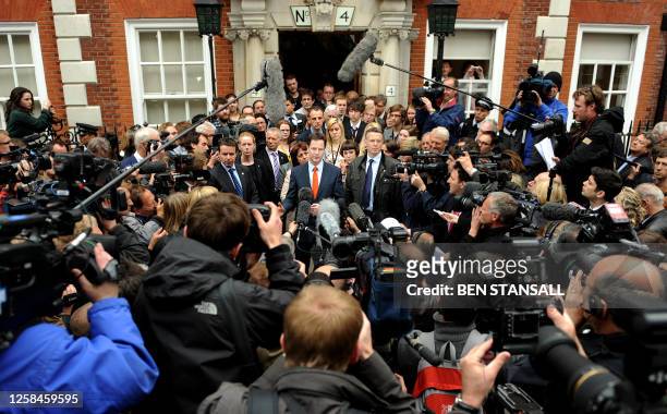 British opposition Liberal Democrat Leader Nick Clegg speaks to the media after returning to the Liberal Democrat headquaters in London on May 7,...