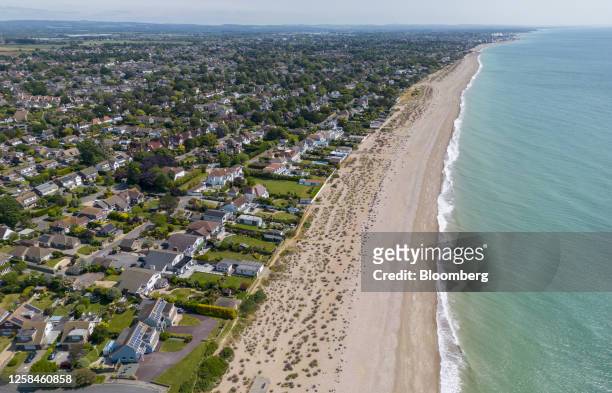 Residential houses next to Pagham Beach in Bognor Regis, UK, on Wednesday, May 31, 2023. As well as the threat of water shortages, underdeveloped...