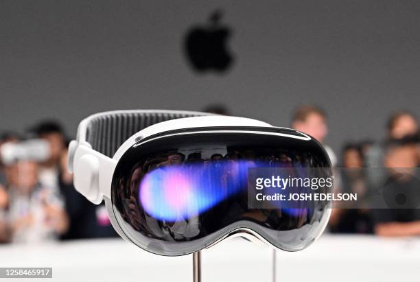 Apple's new Vision Pro virtual reality headset is displayed during Apple's Worldwide Developers Conference at the Apple Park campus in Cupertino,...
