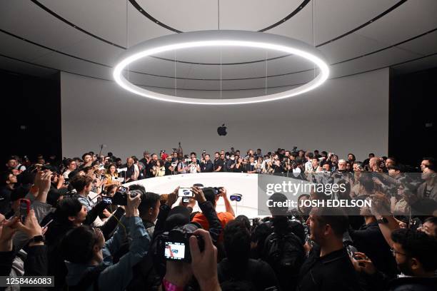 Apple's new Vision Pro virtual reality headset is displayed during Apple's Worldwide Developers Conference at the Apple Park campus in Cupertino,...