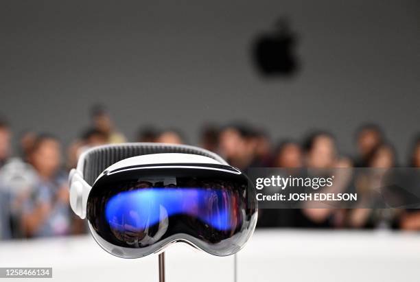 Apple's new Vision Pro virtual reality headset is displayed during Apple's Worldwide Developers Conference at the Apple Park campus in Cupertino,...