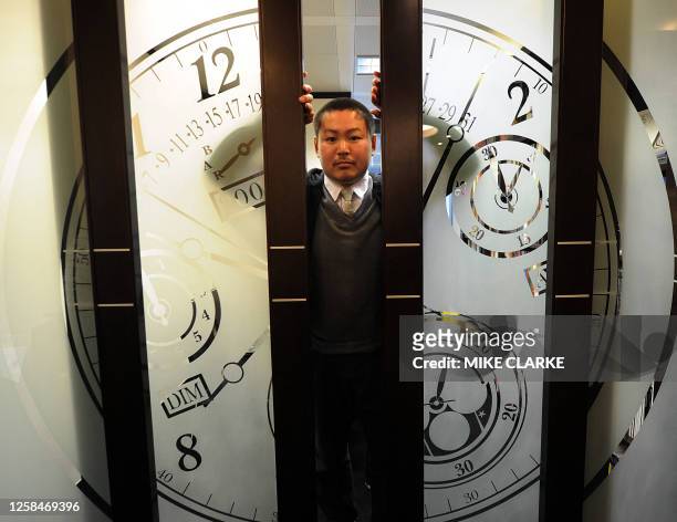 Lifestyle-luxury-HongKong-watches,FEATURE by Adrian Addison This photo taken on January 21, 2011 shows watch expert Genki Sakamoto at the Antiquorum...