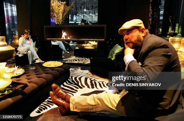 Yuliya Korobko , president of Fashion Planet drinks a tea in a luxary cafe at the Millionaire Fair 2005 in Moscow, 28 September 2005. AFP PHOTO /...