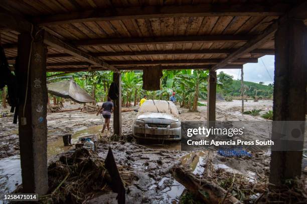 Car stalls in the mud after the overflow of the Teaone River on June 5, 2023 in Tabiazo, Esmeraldas, Ecuador. Six rivers in the Esmeraldas region...
