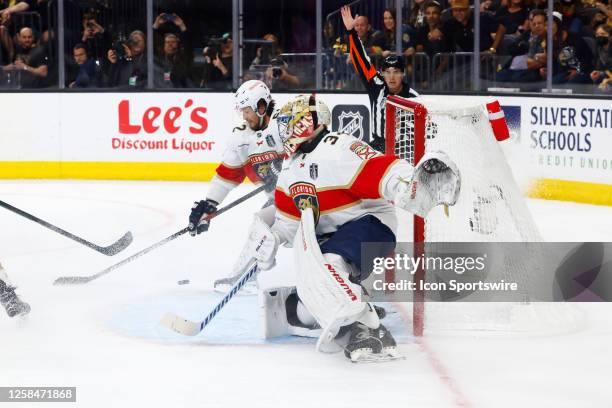 The puck gets past Alex Lyon of the Florida Panthers for a goal during Game Two of the NHL Stanley Cup Final between the Florida Panthers and the...