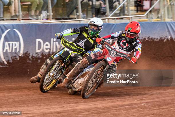 Dan Bewley passes Jason Doyle during the Sports Insure Premiership match between Belle Vue Aces and Ipswich Witches at the National Speedway Stadium,...