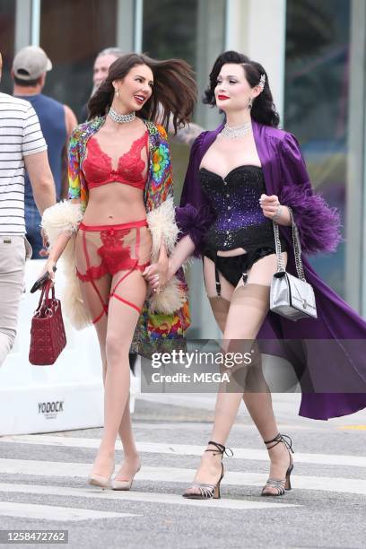 Zita Vass and Paris Volsch Forge are seen at WeHo Pride on June 4, 2023 in West Hollywood, California.