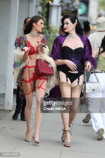 Zita Vass and Paris Volsch Forge are seen at WeHo Pride on June 4, 2023 in West Hollywood, California.