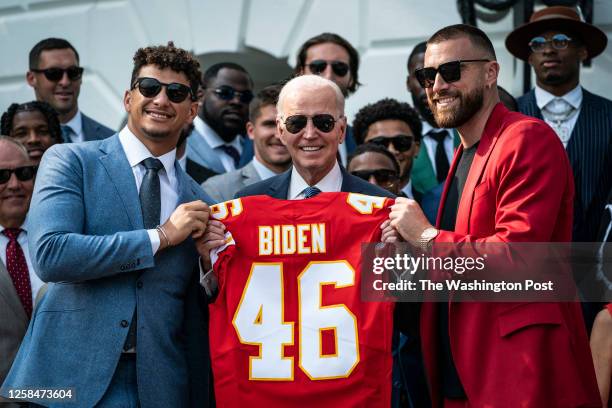 Washington, DC President Joe Biden is presented a jersey from Quarterback Patrick Mahomes and Tight End Travis Kelce as he welcomes the Kansas City...