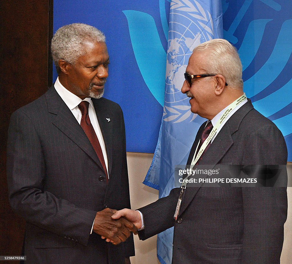 Aziz R Iraqi Deputy Prime Minister Tareq Aziz shakes hands with United... News ...