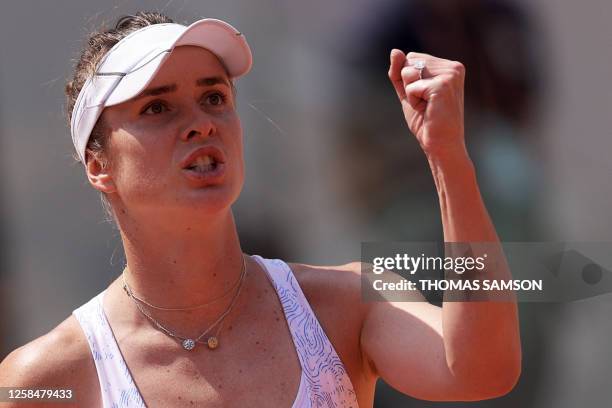 Ukraine's Elina Svitolina reacts after a point to Belarus' Aryna Sabalenka during their women's singles quarter final match on day ten of the...