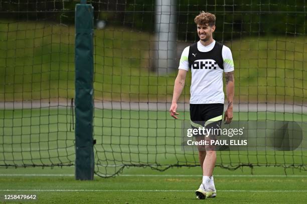 Manchester City's English defender John Stones takes part in a team training session at Manchester City training ground in Manchester, north-west...