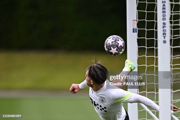 Manchester City's English midfielder Jack Grealish takes part in a team training session at Manchester City training ground in Manchester, north-west...