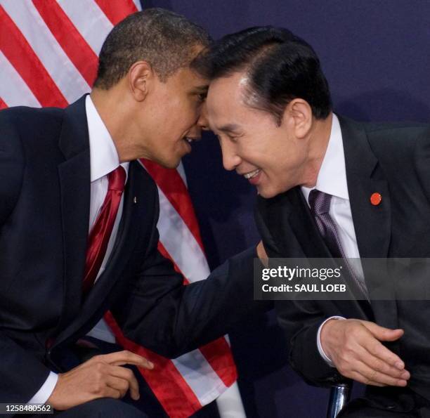 President Barack Obama speaks with South Korean President Lee Myung-Bak during a bilateral meeting on the sidelines of the G20 Summit at the ExCel...