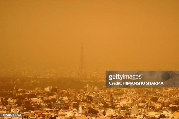 General view shows the city of Ajmer in India's Rajasthan state during a duststorm on June 6, 2023.