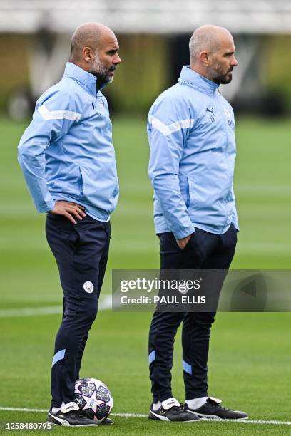 Manchester City's Spanish manager Pep Guardiola takes part in a team training session at Manchester City training ground in Manchester, north-west...