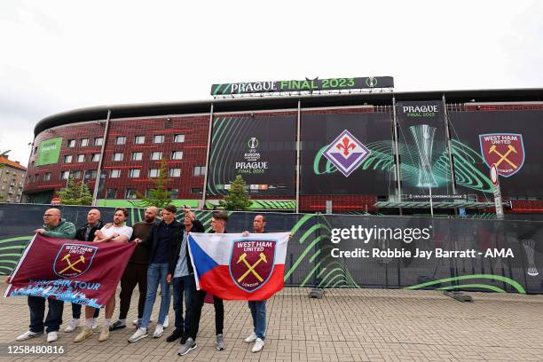 Fans of West Ham United holding flags outside the Eden Arena the host venue of the UEFA Europa Conference League final prior to the UEFA Europa...