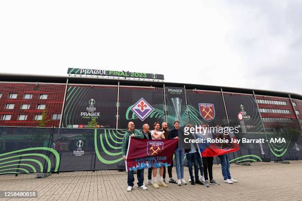 Fans of West Ham United holding flags outside the Eden Arena the host venue of the UEFA Europa Conference League final prior to the UEFA Europa...