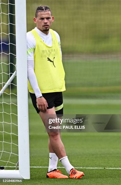 Manchester City's English midfielder Kalvin Phillips takes part in a team training session at Manchester City training ground in Manchester,...