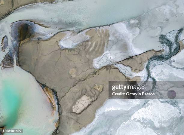 This aerial picture shows the Gossan reservoir at the Rio Tinto mines on June 6, 2023 in Minas de Riotinto, Huelva Province, Spain. The extremely...