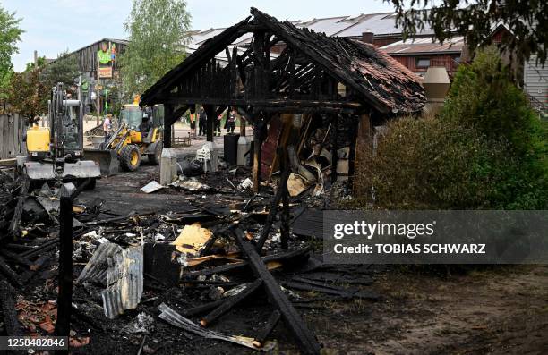 The destroyed structure of a building is pictured after a fire broke out and was extinguished in the Karls Erlebnis-Dorf amusement park in Elstal...