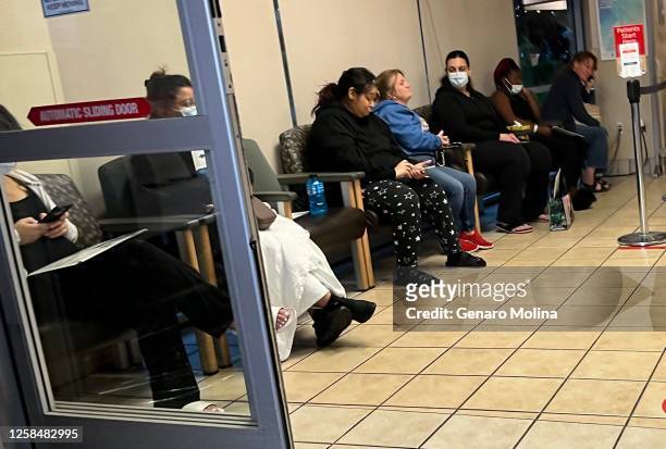 Patients fill out a row of chairs while waiting to be seen at the emergency room at Saint Agnes Medical Center in Fresno, California, on May 9, 2023....