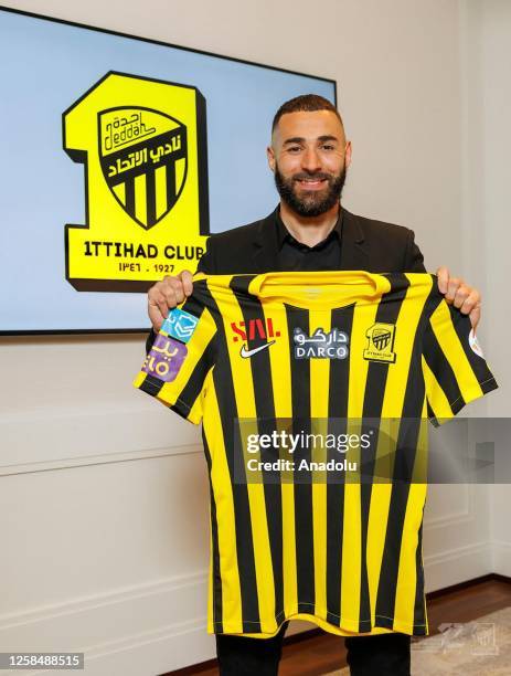 Year-old French soccer star, Karim Benzema holds a jersey of Al-Ittihad, a Saudi Arabian soccer team in Jeddah, Saudi Arabia on June 06, 2023....